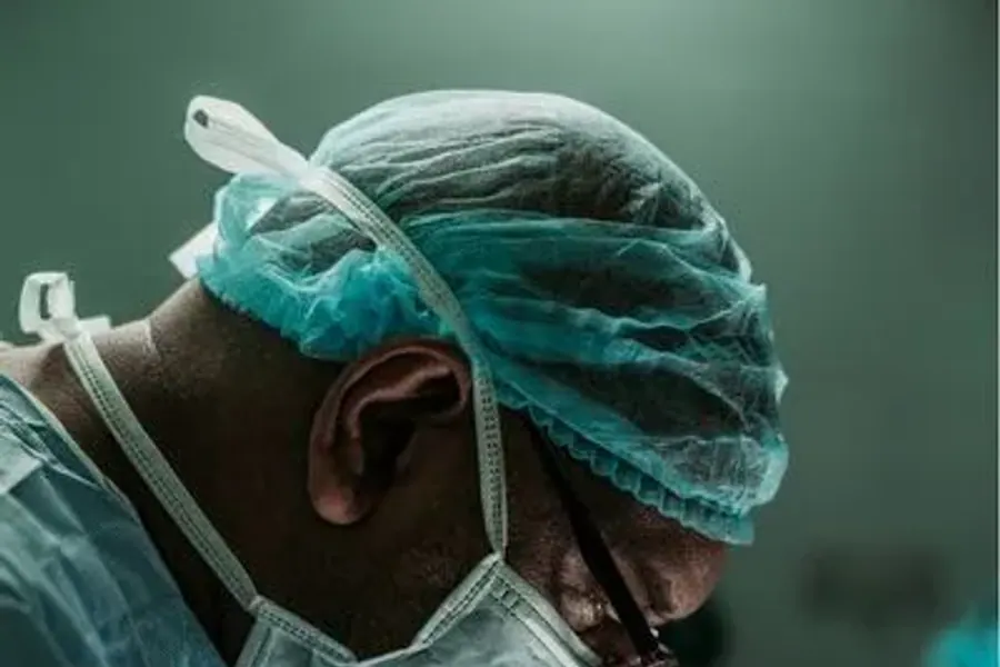 Patient recovering with clinical support after surgery